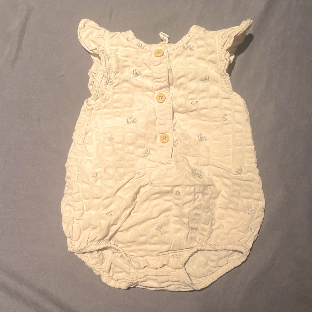Garbo & Friends Cream Garment with Subtle Flower Details